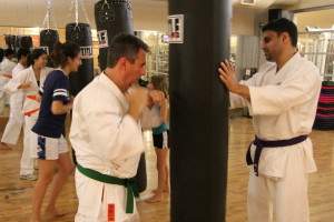 Practicing Heavy-bag Drills at the Full Potential Martial Arts dojo in San Diego
